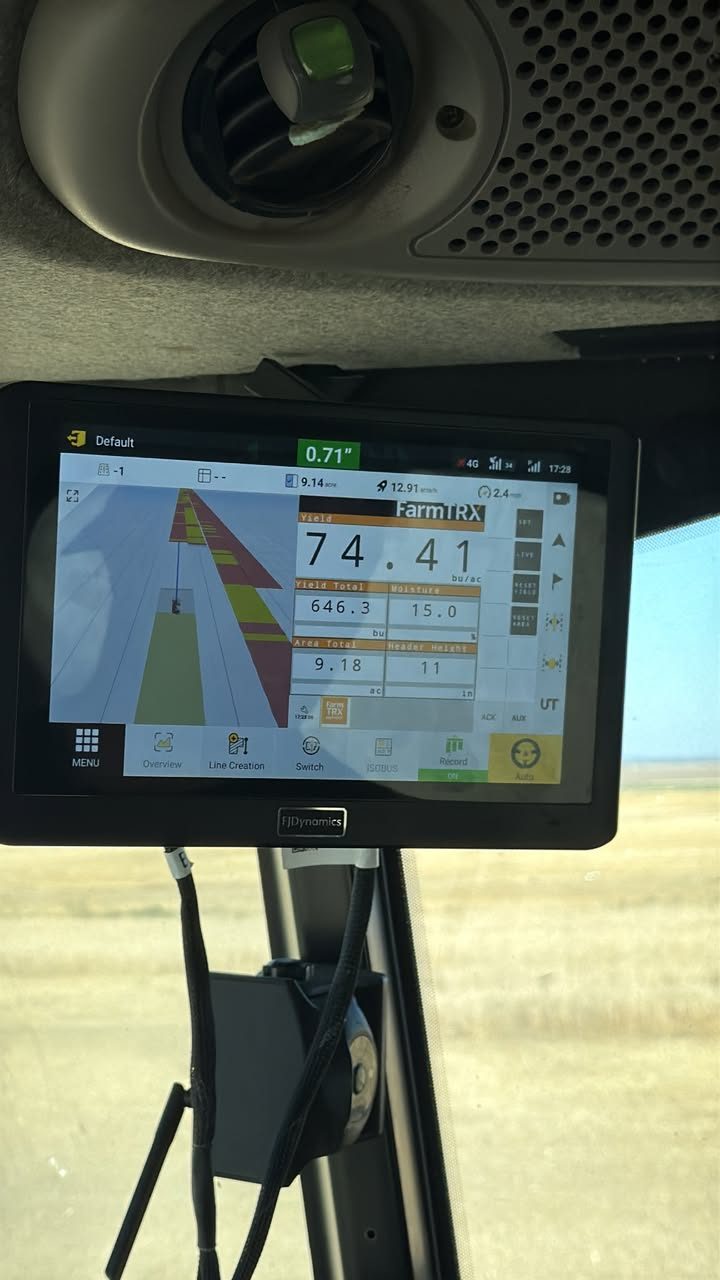 Autosteer display mounted on the cab pillar