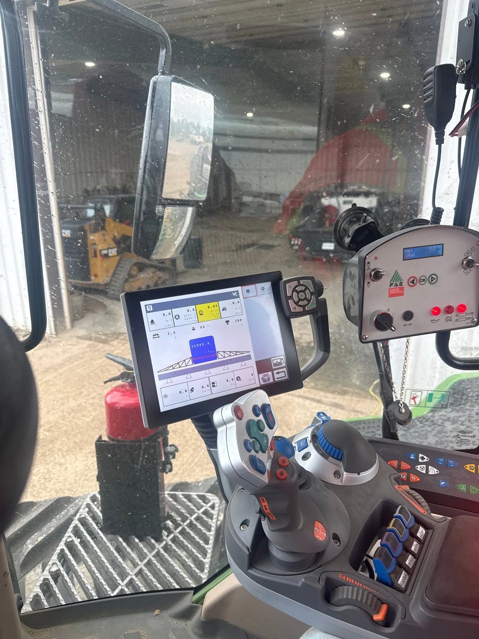 FJDynamics autosteer display installed in a tractor cab
