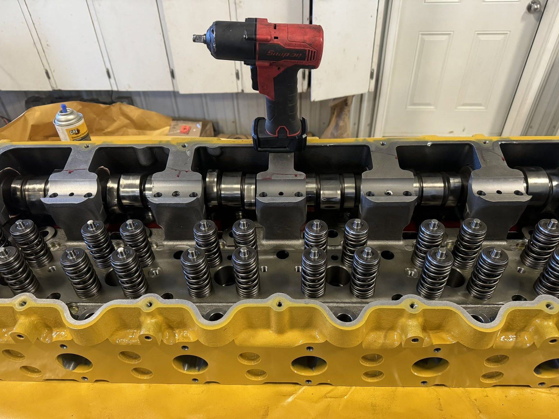 Diesel cylinder head on the bench in the DBS shop